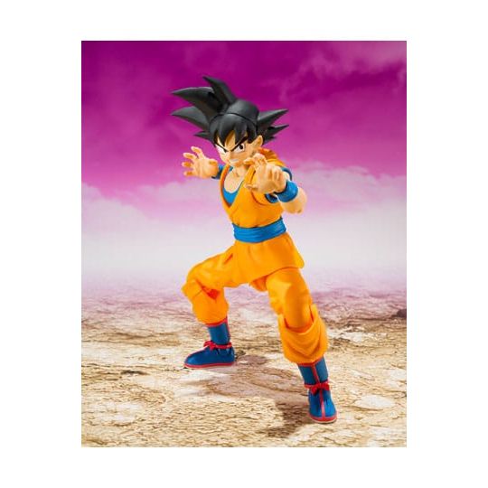Figurine de collection articulée en tenue orange sur fond violet, exclusivité Sanctuary Collector