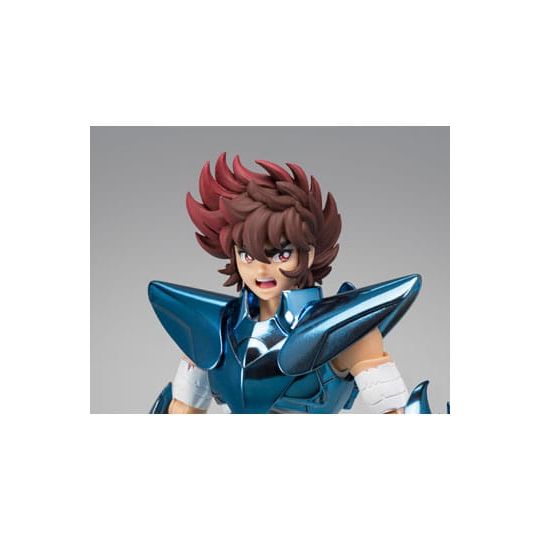 Figurine de collection exclusive en armure bleue, cheveux bruns hérissés, présentée sur fond neutre.