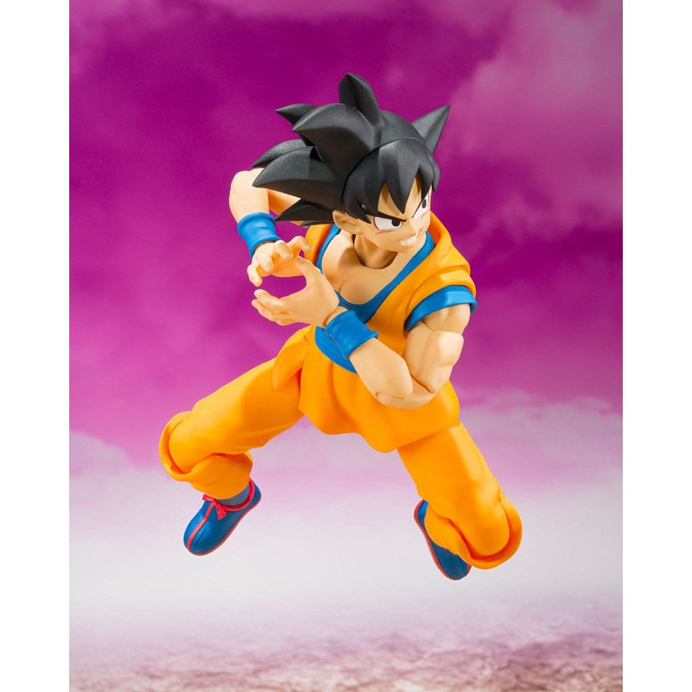 Figurine de collection articulée en tenue orange sur fond violet, exclusivité Sanctuary Collector